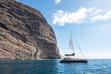 Boat on the water near the rocks