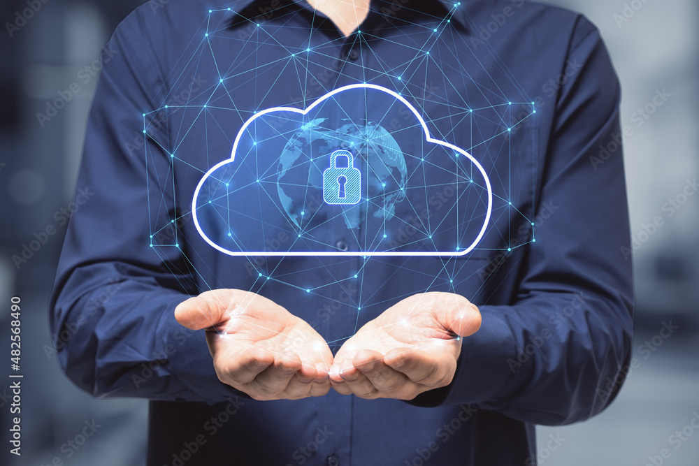 Poster close up of businessman hand holding abstract glowing cloud hologram with globe and safety icons, po