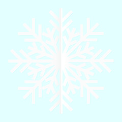 White paper snowflake isolated on a blue background