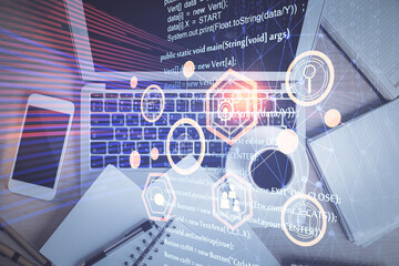 Multi exposure of data theme drawing hologram over topview work desk background with computer. Concept of technology.
