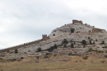Fototapeta na wymiar Old fortress in the mountains