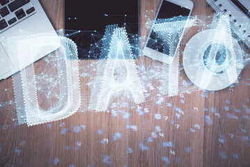Double exposure of technology theme drawing over work table desktop. Top view. Global data analysis concept.