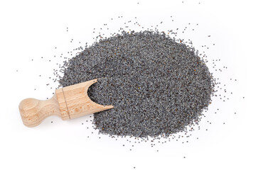 Heap of poppy seeds with a wooden spice spoon