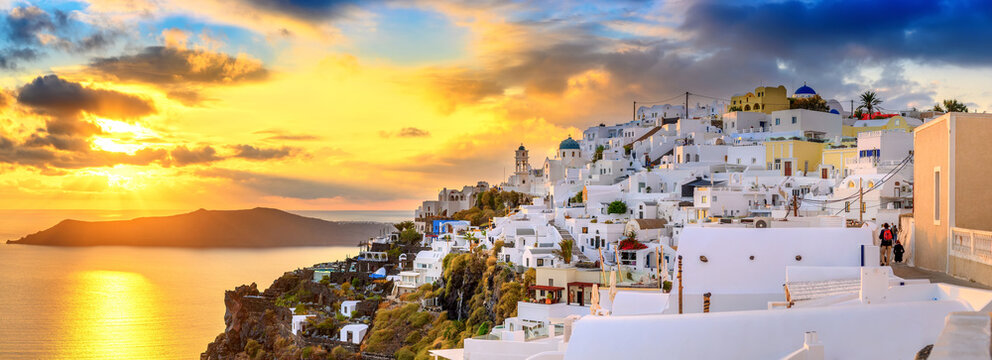 Fantastic sunset on famous view over greek resort Fira, Greece, Europe. luxury travel. famous travel landscape. Summer holidays. Travel concept background.