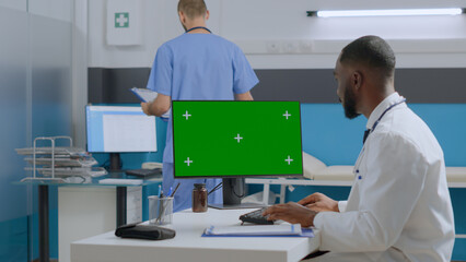 African american therapist doctor typing sickness expertise analyzing medical documents developing...