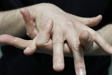 Close up of male Caucasian hands