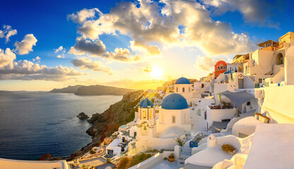Picturesque sunset on famous view resort over Oia town on Santorini island, Greece, Europe. luxury...