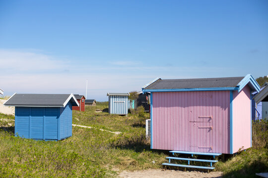 Tisvilde, Denmark - April 29, 2018: Colorful wooden beach huts at Tisvilde beach