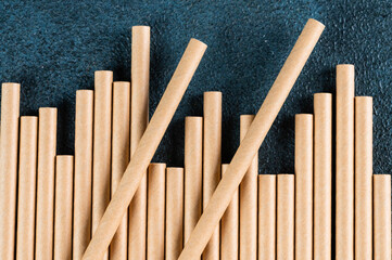 Eco friendly Reusable Straw. Paper cocktail tubes. Kraft paper straw for drinking coffee or tea. Disposable cocktail tube. Zero waste concept.