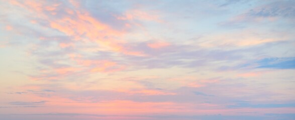 Clear sky, glowing cirrus and cumulus clouds after the storm, soft sunlight. Dramatic sunset cloudscape. Meteorology, weather, climate, heaven, peace. Graphic resources. Picturesque panoramic scenery