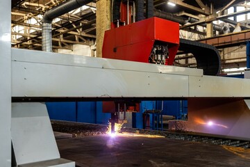 Plasma welding and metal cutting in industry. High-tech production processes at the plant