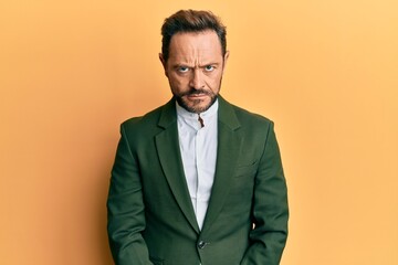 Middle age man wearing business suit skeptic and nervous, frowning upset because of problem....