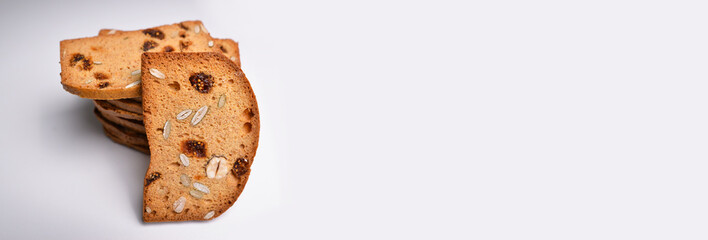 Crunchy Rusk or Toast for healthy life, Traditional biscuit , toast bread, crunchy toast, crispy milk rusk. Defocused blurred view. Food panoramic banner. 