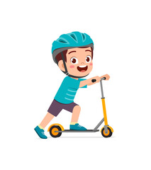 cute little boy riding scooter and wear helmet