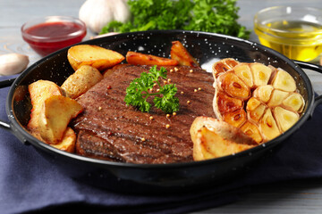 Concept of tasty food with beef steak, close up