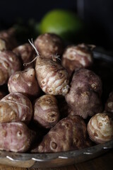 Jerusalem artichokes in the bowl. 