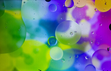 Abstract colorful background. Blurred colored drawing. Bubbles on a cheerful background.