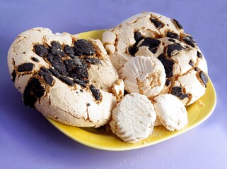 white meringue cakes with chocolate as sweet dessert 