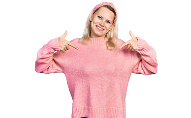 Young caucasian woman wearing casual clothes looking confident with smile on face, pointing oneself with fingers proud and happy.