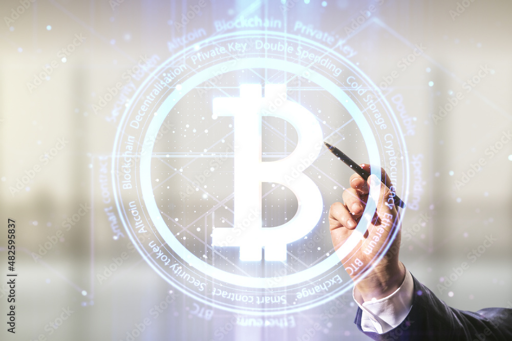 Poster man hand with pen working with virtual bitcoin sketch on blurred office background. double exposure