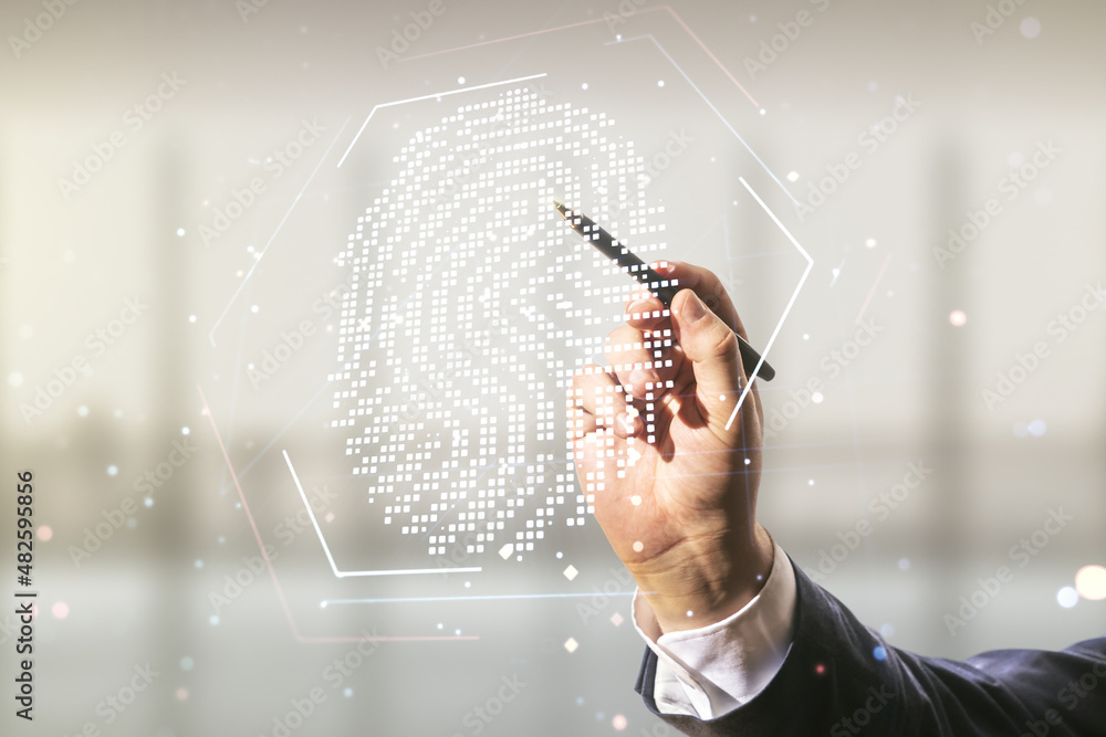 Poster man hand with pen working with abstract virtual fingerprint hologram on blurred office background. m