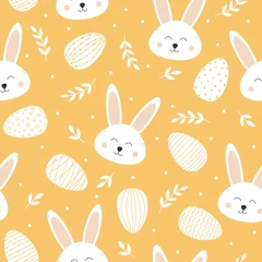 Foto op Canvas Seamless pattern with cute bunny and easter eggs. Lovely rabbit on yellow background. Background for easter design © Yaryna