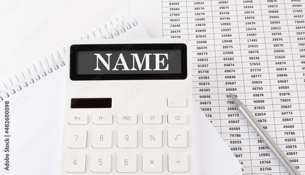 Poster calculator with text name on the notebook . business, finance conceptual.