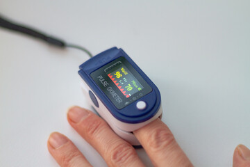 Pulse oximeter measurements of the oxygen level in the blood are 99-98 percent normal