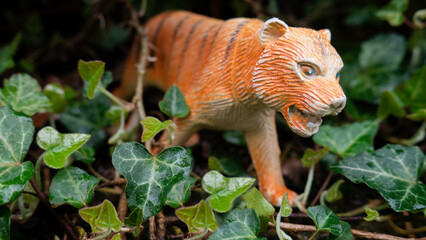 Children's toy tiger with open mouth.