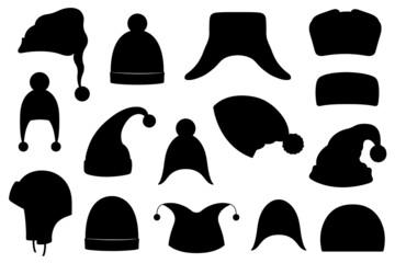Collection of different winter hats isolated on white