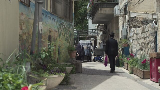 Residents of Jerusalem on the cozy Mea Shearim street