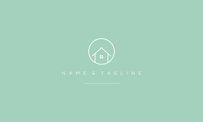 Fototapeta premium A line art icon logo of a house with a circle.