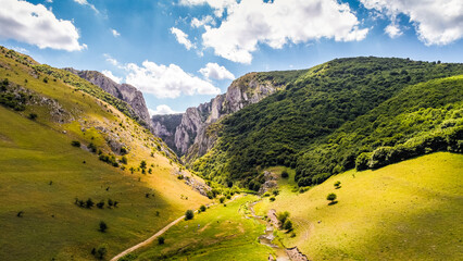 Aerial view over Turda Gorges - Cheile Turzii next to Cluj-Napoca in Romania during a summer day....