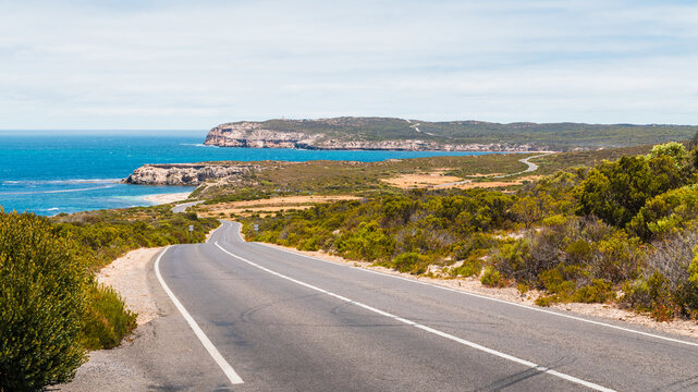 Winding road along the coast of Innes National Park on a bright day, Yorke Peninsula, South Australia