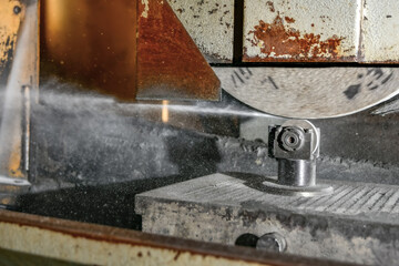 Finishing and roughing of the abrasive wheel with diamond dressing on a surface grinder.