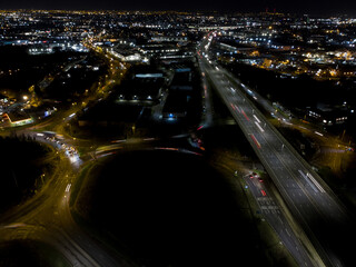 Fototapeta na wymiar Night aerial view of the Black Country and Birmingham UK with motorway traffic