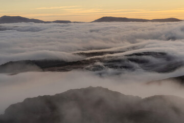 Snowdonia national park winter mountain landscape with cloud inversion 