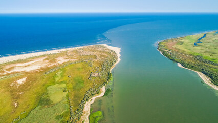 Aerial view of the place where Danube River merges with Black Sea in Romania