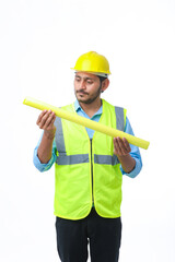 Young architect man with helmet and holding blueprints in hand. on white background.
