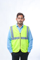 Young Indian engineer giving expression on white background.