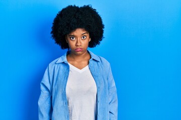 Fototapeta na wymiar Young african american woman wearing casual clothes skeptic and nervous, frowning upset because of problem. negative person.