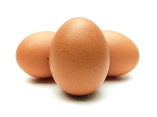 Close-up photo of fresh organic chicken eggs from farm on white background.