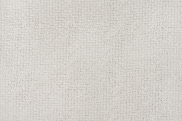 White natural texture of knitted wool textile material background. White crochet cotton fabric woven canvas texture. close up