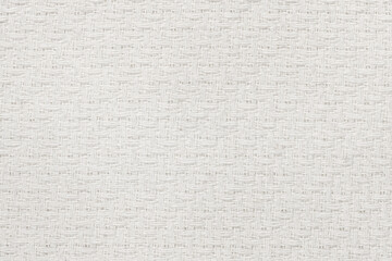 White natural texture of knitted wool textile material background. White crochet cotton fabric woven canvas texture. close up