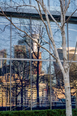 Reflection of City of London skyscrapers in another glass building, London, England, UK