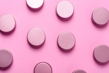 Set of tin metal boxes, cases. on pink background