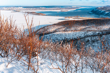 Amazing winter landscape in the mountains, top view. The snow lies on the mountains and the trees are covered with ice. Russia, Togliatti