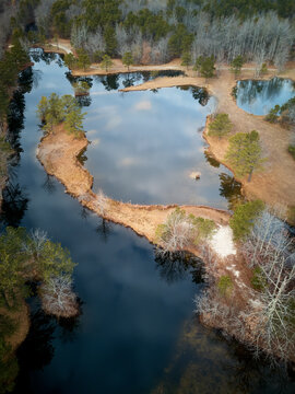 Aerial Drone image of a small pond during winter