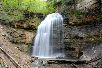 Fototapeta na wymiar A small waterfall in the woods near Hamilton, Ontario.