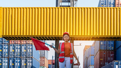 Foreman hold flag and wave the flag to stop forklift when CEO walk pass intront of Forklift